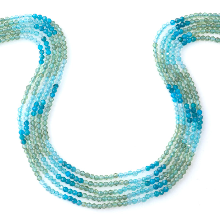 This is a Dakota Stones 3mm Blue Green Apatite Banded Gemstone strand with faceted round beads in 15-16 inch strand.