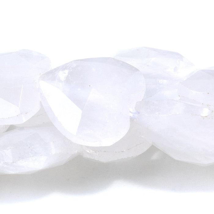 This is a Dakota Stones 14mm Crystal Quartz Gemstone strand with faceted heart beads in 15-16 inch strand.