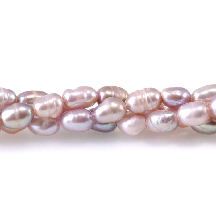 This is a Dakota Stones 3-4mm Freshwater Pearl Pink Rice Gemstone strand of round beads.