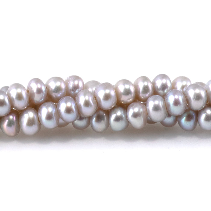 This is a Dakota Stones 4mm Freshwater Pearl Silver Gemstone strand with rondelle beads.