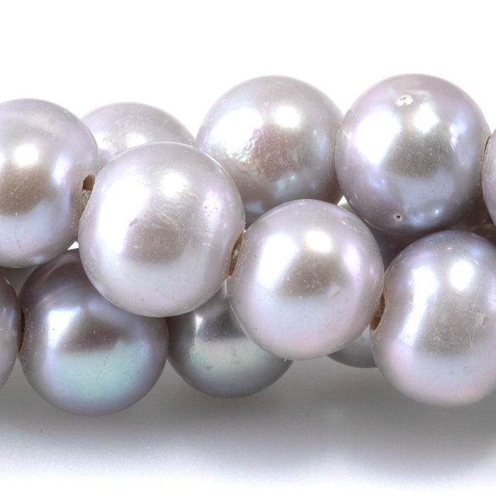 This is a Dakota Stones 9-10mm Freshwater Pearl Silver Potato 2mm Gemstone strand of round beads in 8 inch strand.