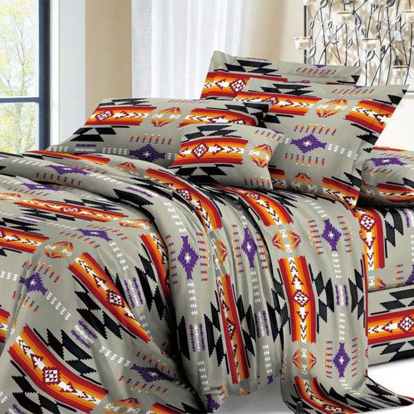 Queen 4pc Reversible Comforter Bed Set – Grey featuring a Navajo print in vibrant colors.