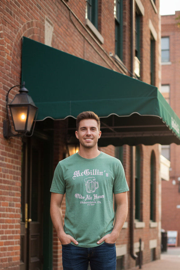 Green t-shirt with white text and beer mug graphic