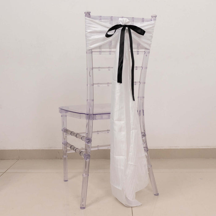 Clear chiavari chair with white and black ribbon decor