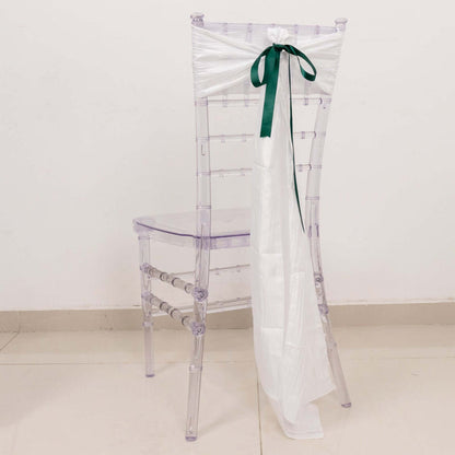 Clear acrylic chair with white and green decorative bow