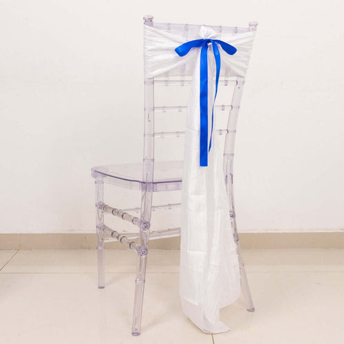 Clear acrylic chair with white and blue ribbon decoration