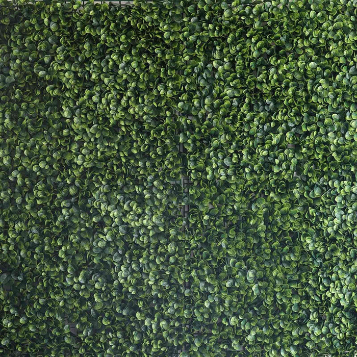 Artificial green leaf wall panel for home decor and landscaping.