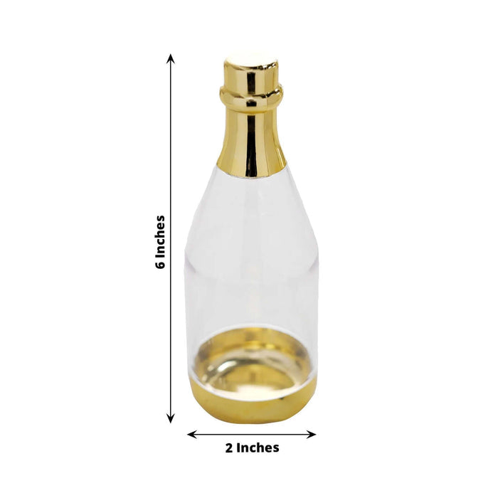 Clear glass bottle with gold accents, 6 inches tall and 2 inches wide.