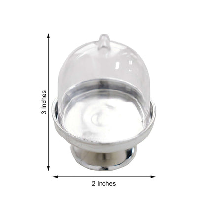Mini glass cloche with silver base, 2 inches wide and 3 inches tall.