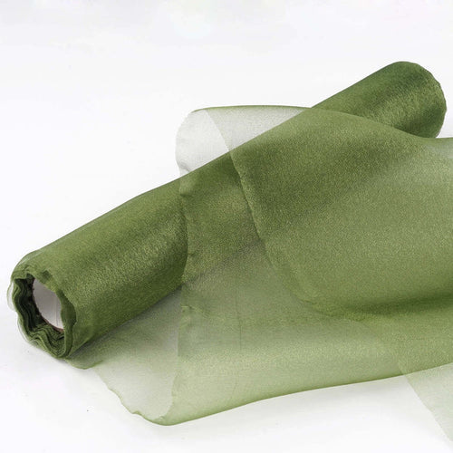 Green sheer fabric roll on a white background