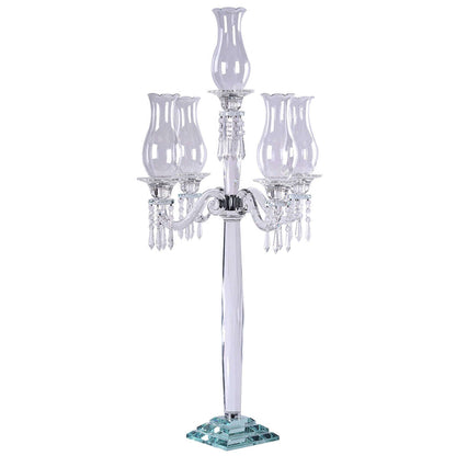Elegant crystal candelabra with five glass shades, featuring a modern design. #whtbkgd
