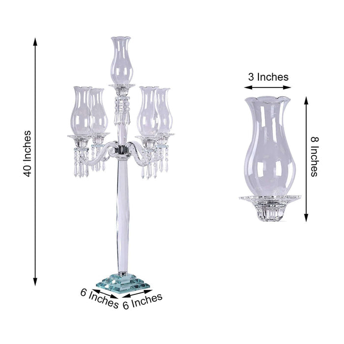Elegant crystal candelabra with five candle holders, 40 inches tall.