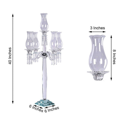 Elegant crystal candelabra with five candle holders, 40 inches tall.