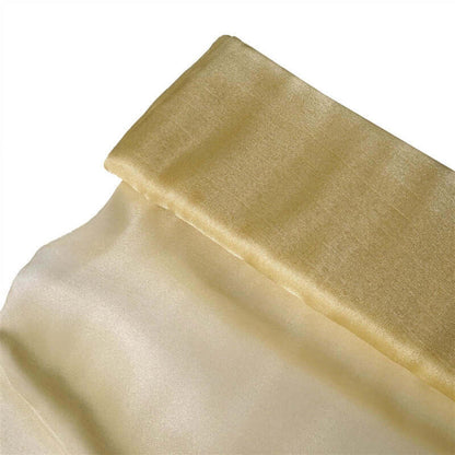 Gold satin fabric with a smooth finish and elegant sheen. #whtbkgd