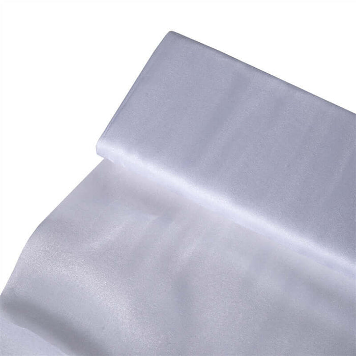 White sheer fabric roll on a plain background. #whtbkgd