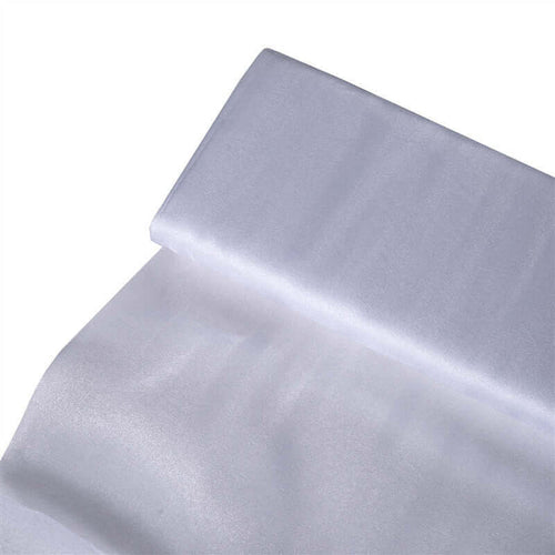 White sheer fabric roll on a plain background. #whtbkgd