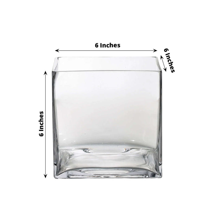 Clear glass square vase, 6 inches x 6 inches.