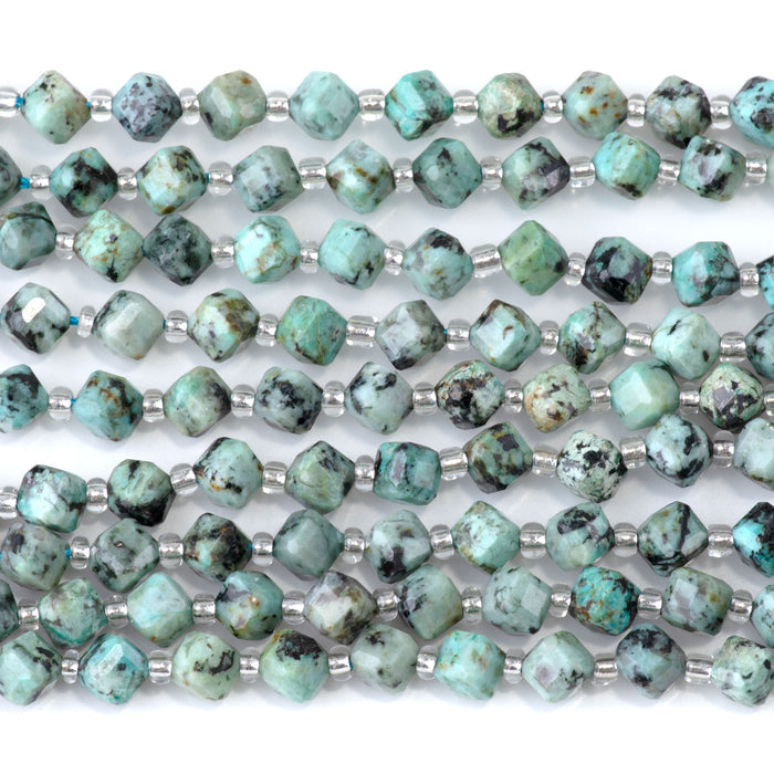 This is a Dakota Stones 4x6mm African Turquoise Corner Gemstone strand with table-cut cube beads in 15-16 inch strand.