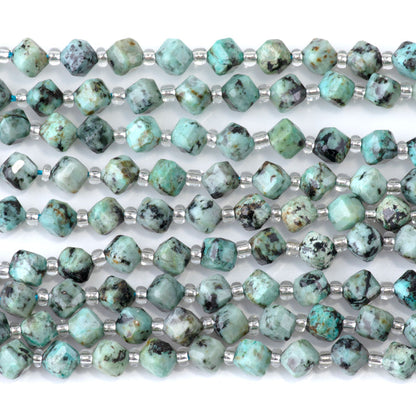 This is a Dakota Stones 4x6mm African Turquoise Corner Gemstone strand with table-cut cube beads in 15-16 inch strand.