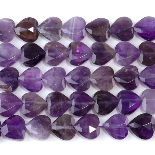 This is a Dakota Stones 14mm Amethyst Gemstone strand with A grade faceted heart beads in 15-16 inch strand.