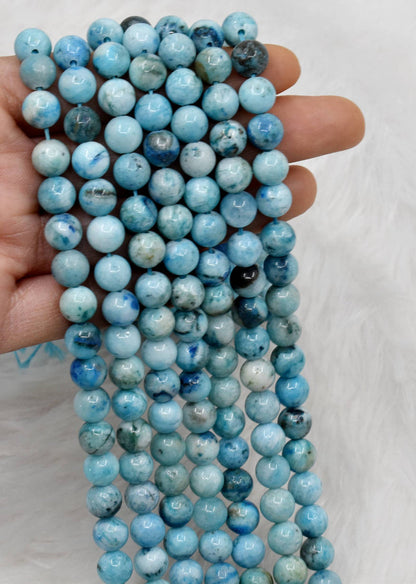 Aragonite A Grade Round Beads-hand