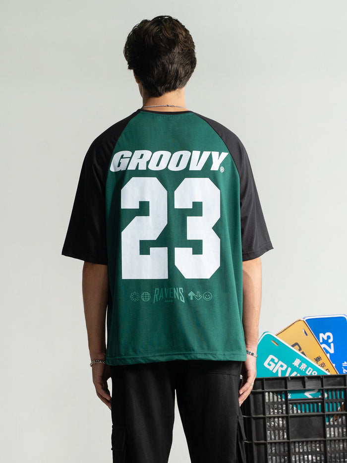 Athletic Department Raglan female model front view deep green black Pakistan – GROOVY