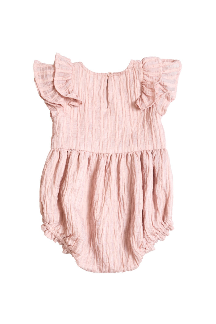 The Ivy City Co Baby Hattie Romper in Pink Stripes features short ruffled sleeves, a crinkled texture, elastic leg openings, a gathered waist, and back button closure. Its soft fabric makes it perfect for playful Mom and Me matching moments.