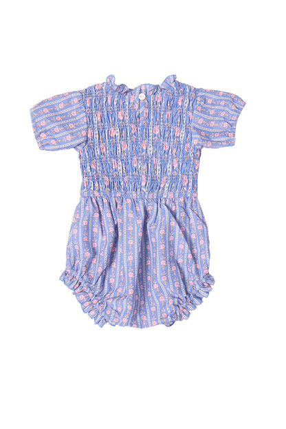 The Ivy City Co Baby Mariah Romper in Linear Print is a short-sleeved romper with smocked detailing, pink floral pattern, button-back closure, and elastic leg openings for comfort.