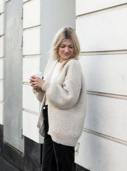 Balloon Jacket designed by PetiteKnit, white knitted cardigan or jacket with large balloon shaped sleeves, the side