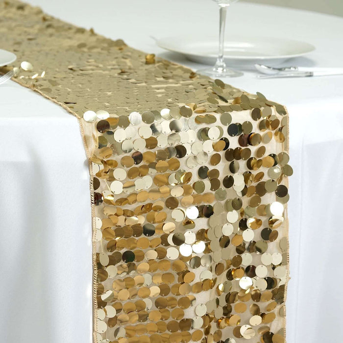 Gold sequin table runner on a white table setting for elegant events.