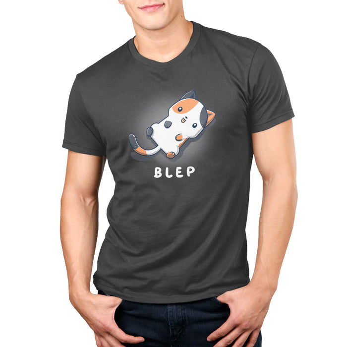 Premium Cotton T-shirt_TeeTurtle charcoal gray Blep Kitty apparel featuring an illustration of a calico cat laying on its back with its tongue sticking out. The word "BLEP" is written below.