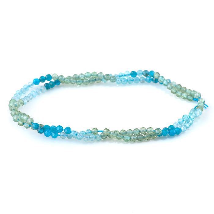 This is a Dakota Stones 3mm Blue Green Apatite Banded Gemstone strand with faceted round beads in 15-16 inch strand.