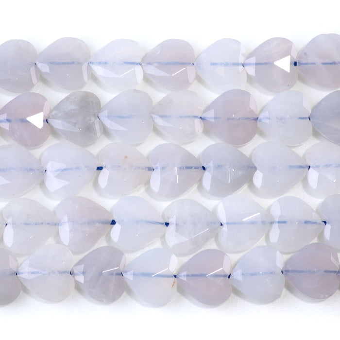 This is a Dakota Stones 14mm Rose Quartz Gemstone strand with faceted heart beads in 15-16 inch strand.