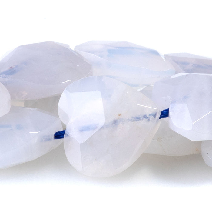 This is a Dakota Stones 14mm Rose Quartz Gemstone strand with faceted heart beads in 15-16 inch strand.