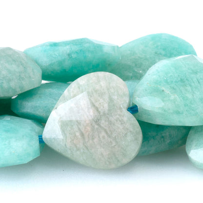 This is a Dakota Stones 14mm Brazilian Amazonite Gemstone strand with A grade faceted heart beads in 15-16 inch strand.