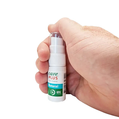Care Plus Natural Citriodiol Insect Repellent Spray 15ml shown agaisnt someones hand for size comparison on a white background
