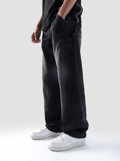 Carpenter washed black denim male model back view charcoal wash utility loop Pakistan – GROOVY