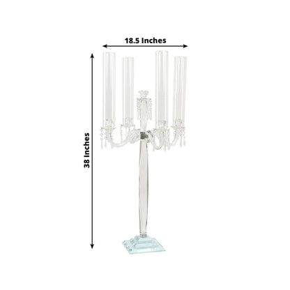 Elegant 5-arm crystal candelabra with clear glass candle holders, 38 inches tall.