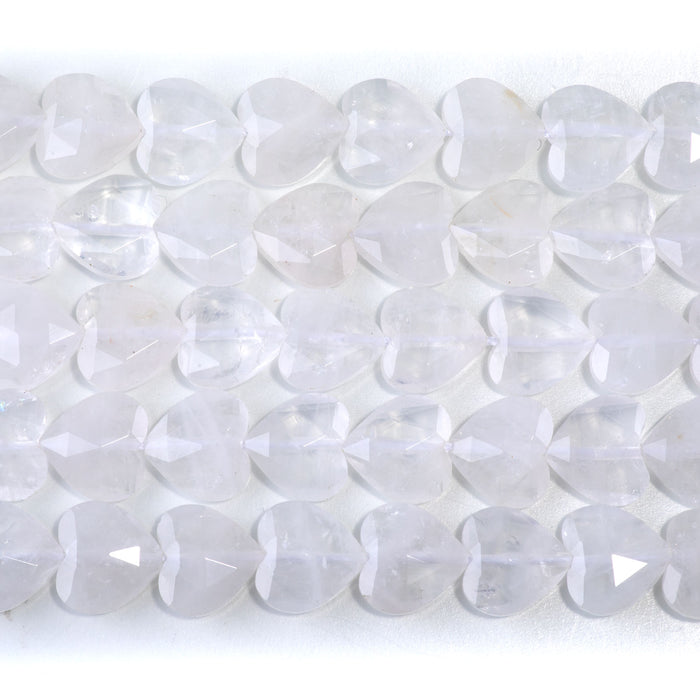 This is a Dakota Stones 14mm Crystal Quartz Gemstone strand with faceted heart beads in 15-16 inch strand.