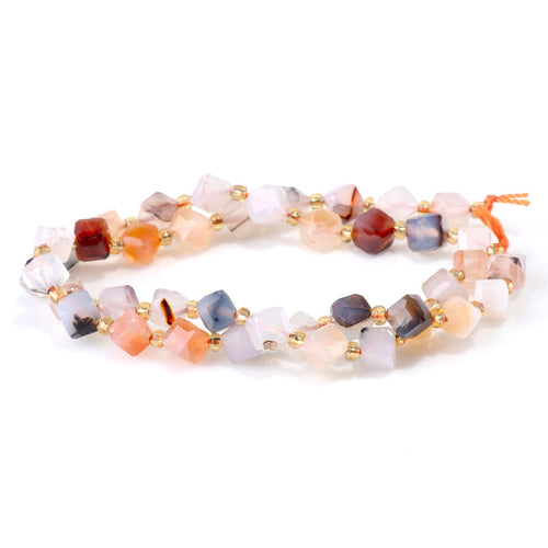 This is a Dakota Stones 6x8mm Dendritic Agate Corner Gemstone strand with table-cut cube beads in 15-16 inch strand.