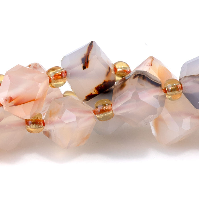 This is a Dakota Stones 6x8mm Dendritic Agate Corner Gemstone strand with table-cut cube beads in 15-16 inch strand.