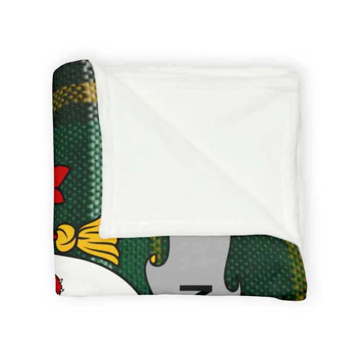 Dillon printed throw blanket with the family crest, styled as a cozy winter throw