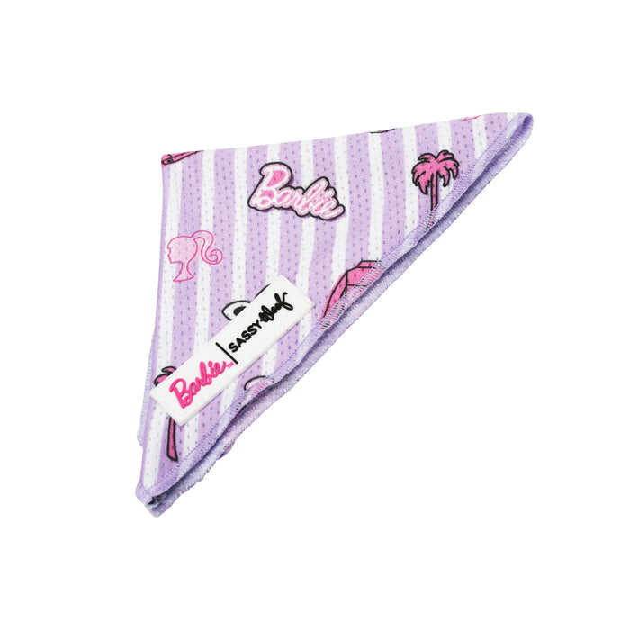 The Sassy Woof Dog Bandana - BARBIE™ Closet Goals features lavender stripes, Barbie-themed designs (logos, palm tree, car), lightweight mesh fabric, and two stitched labels: Barbie and Sassy Woof.