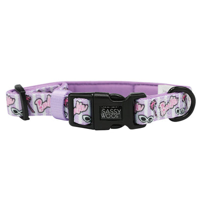 The Sassy Woof Dog Collar - BARBIE™ Closet Goals features playful sunglasses, lips, and Barbie pink text with a black buckle and label. Adjustable for comfort, it's perfect for trendy pups who love style.