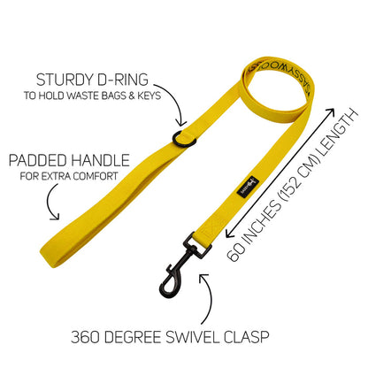 Introducing the Sassy Woof Dog Collar Three Piece Bundle in Neon Yellow: This bundle features a neon yellow dog leash with a padded handle for added comfort, a sturdy D-ring for attaching waste bags, and a 360-degree swivel clasp to prevent tangling. The leash measures 60 inches (152 cm) long and coordinates perfectly with other neon yellow accessories. Text labels highlight each key feature.