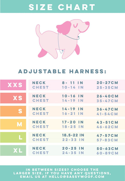 Size chart for Sassy Woof Dog Two Piece Bundle - BARBIE™ On a Roll harnesses, showing neck and chest measurements in inches/cm for XXS–XL. Above, a pink smiling dog wears a Barbie x Sassy Woof harness.