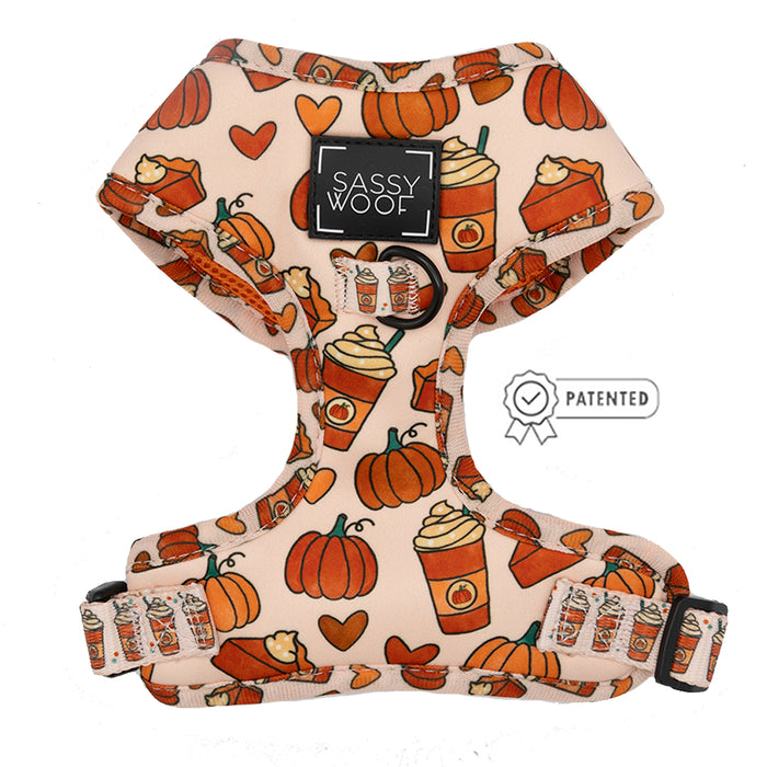 The Sassy Woof “Dog Two Piece Bundle - Pie There” features a beige adjustable harness with an autumn-themed print of pumpkins, pie slices, coffee cups, and hearts. Includes a Patented badge and matching leash for a perfect pair.