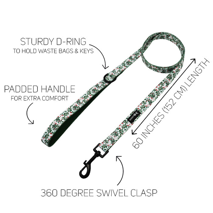 The Sassy Woof Dog Two Piece Bundle - Under the Mistletoe features a floral dog leash with padded handle, sturdy D-ring, 60-inch (152 cm) length, 360° swivel clasp, and an adjustable harness—ideal for your puppy’s growth. Each feature is clearly labeled.