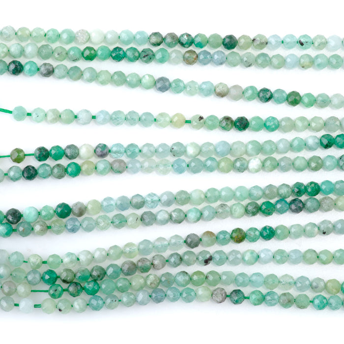 This is a Dakota Stones 3mm Emerald Banded Gemstone strand with faceted round beads in 15-16 inch strand.