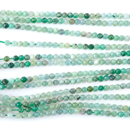 This is a Dakota Stones 3mm Emerald Banded Gemstone strand with faceted round beads in 15-16 inch strand.